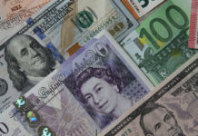 Доллар стал «мальчиком для битья»: индекс американской валюты показал сильнейшее падение за полвека